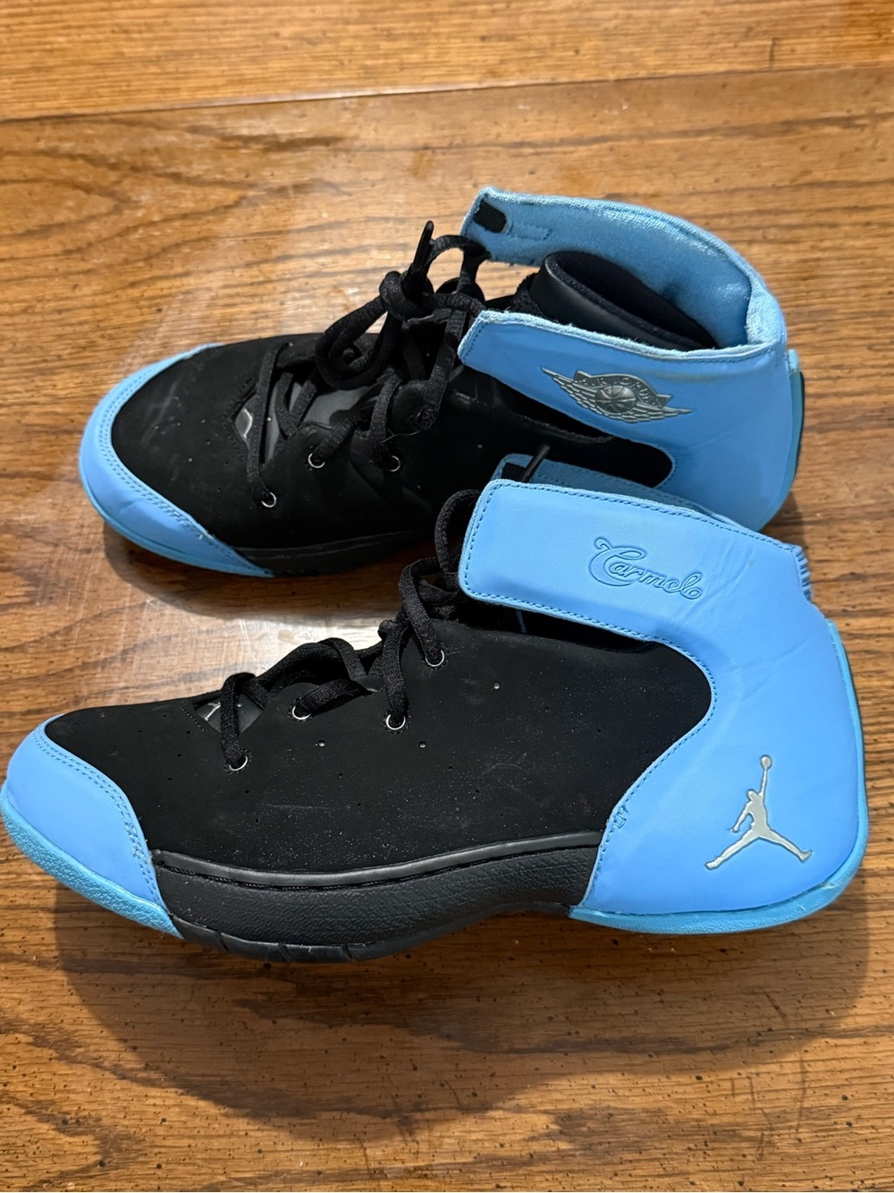 Kids Nike Melo 1.5 shoes black/university blue.